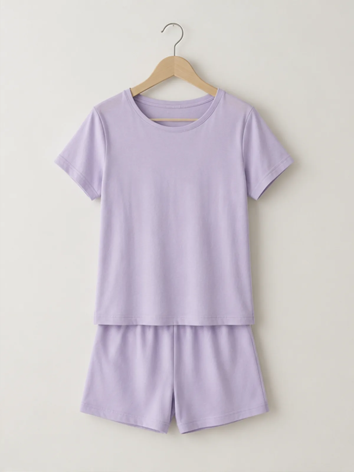 alba cotton set 2.webp alba cotton set hanging on a wooden hanger