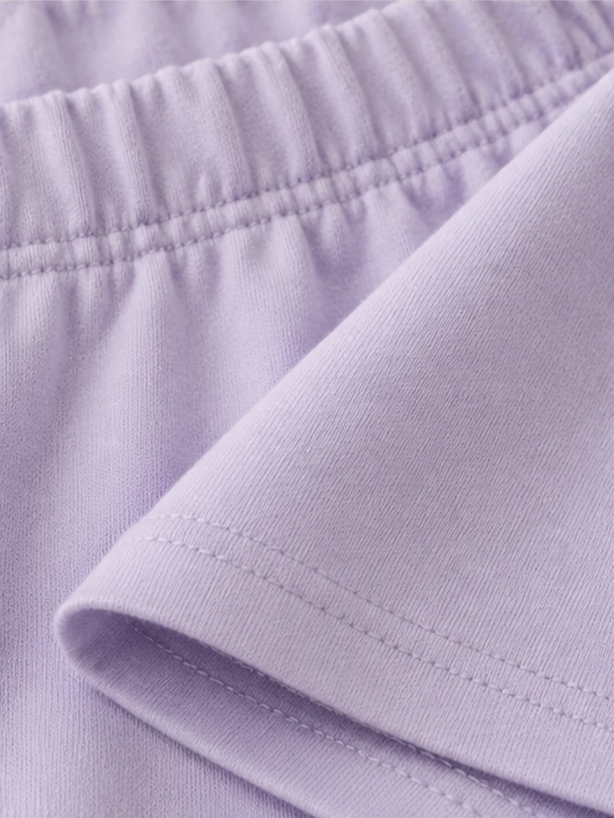 alba cotton set 3.webp Close-up of the cotton weave and stitching on the alba cotton set