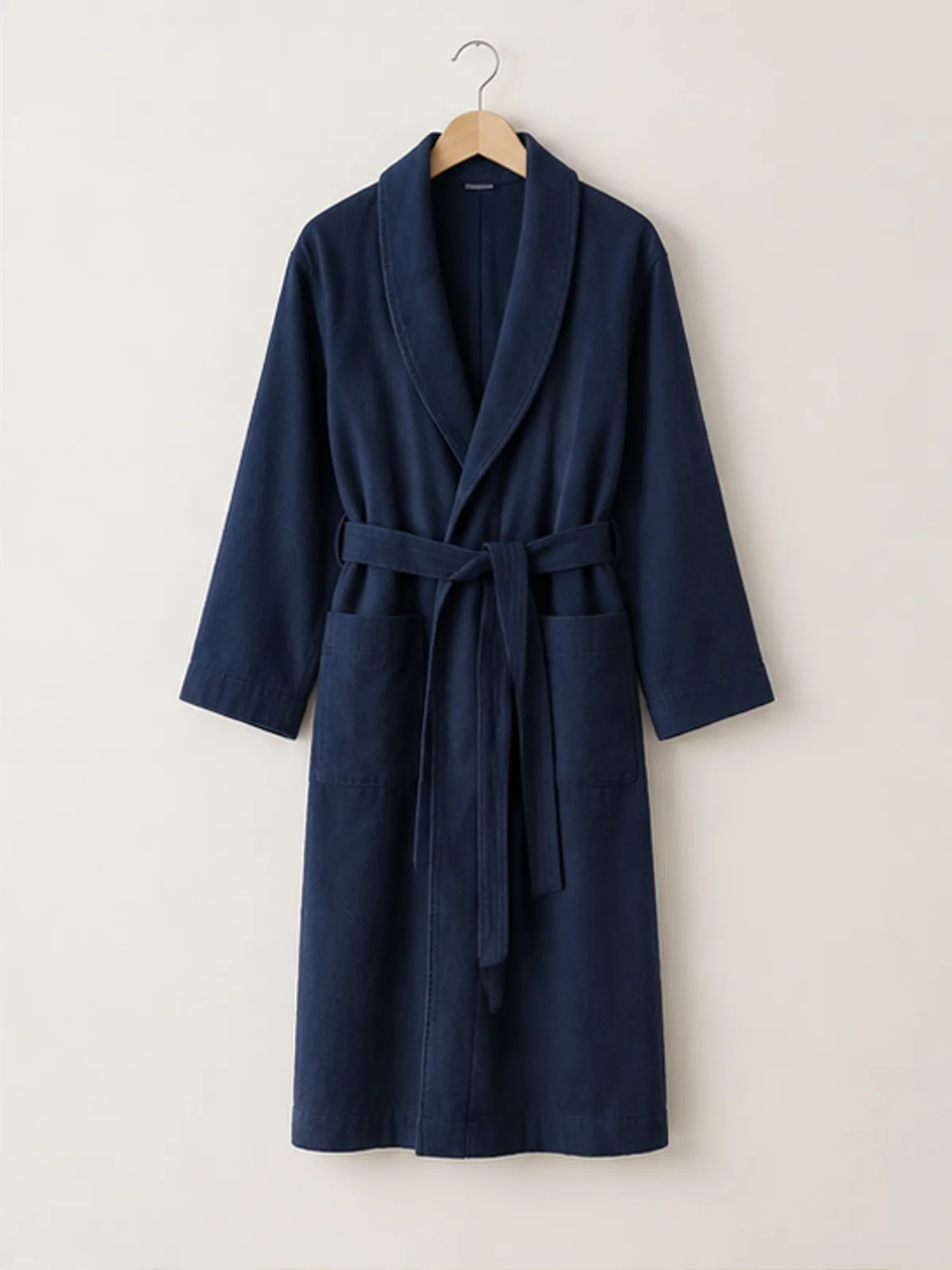 harbour cotton robe 2.webp harbour cotton robe hanging on a wooden hanger