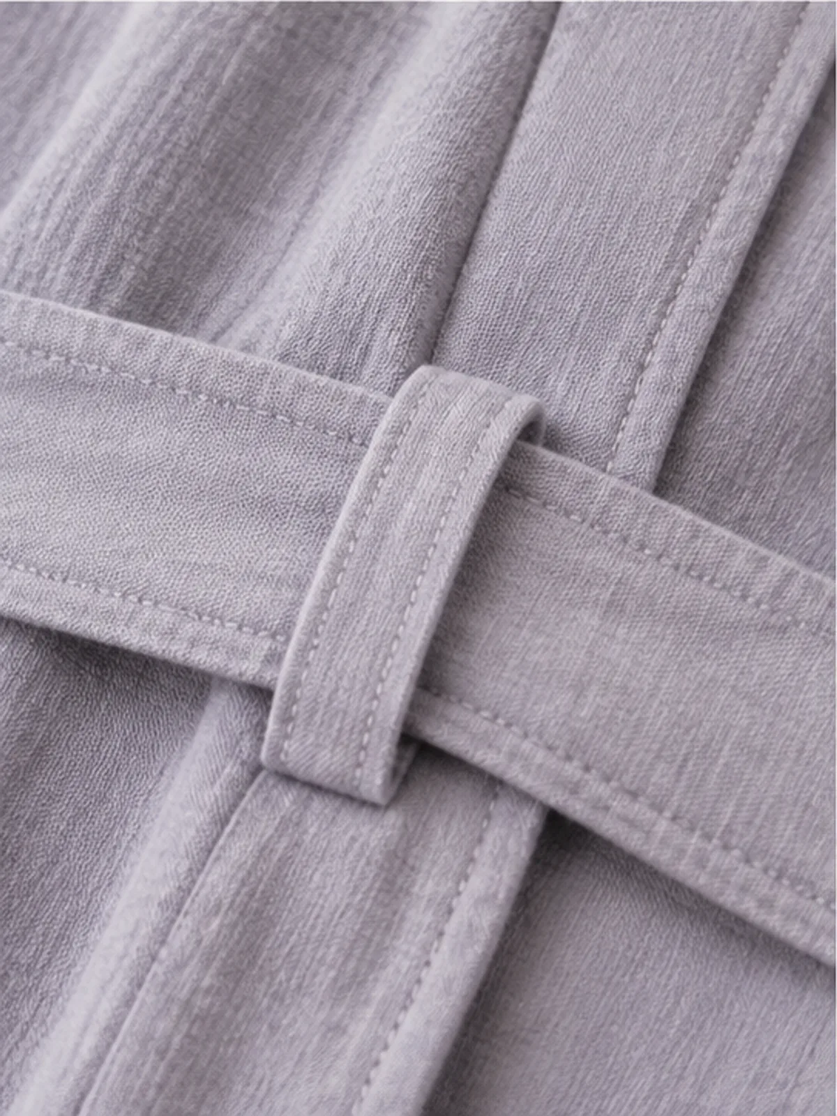 meadow cotton robe 3.webp Close-up of the cotton weave and stitching on the meadow cotton robe