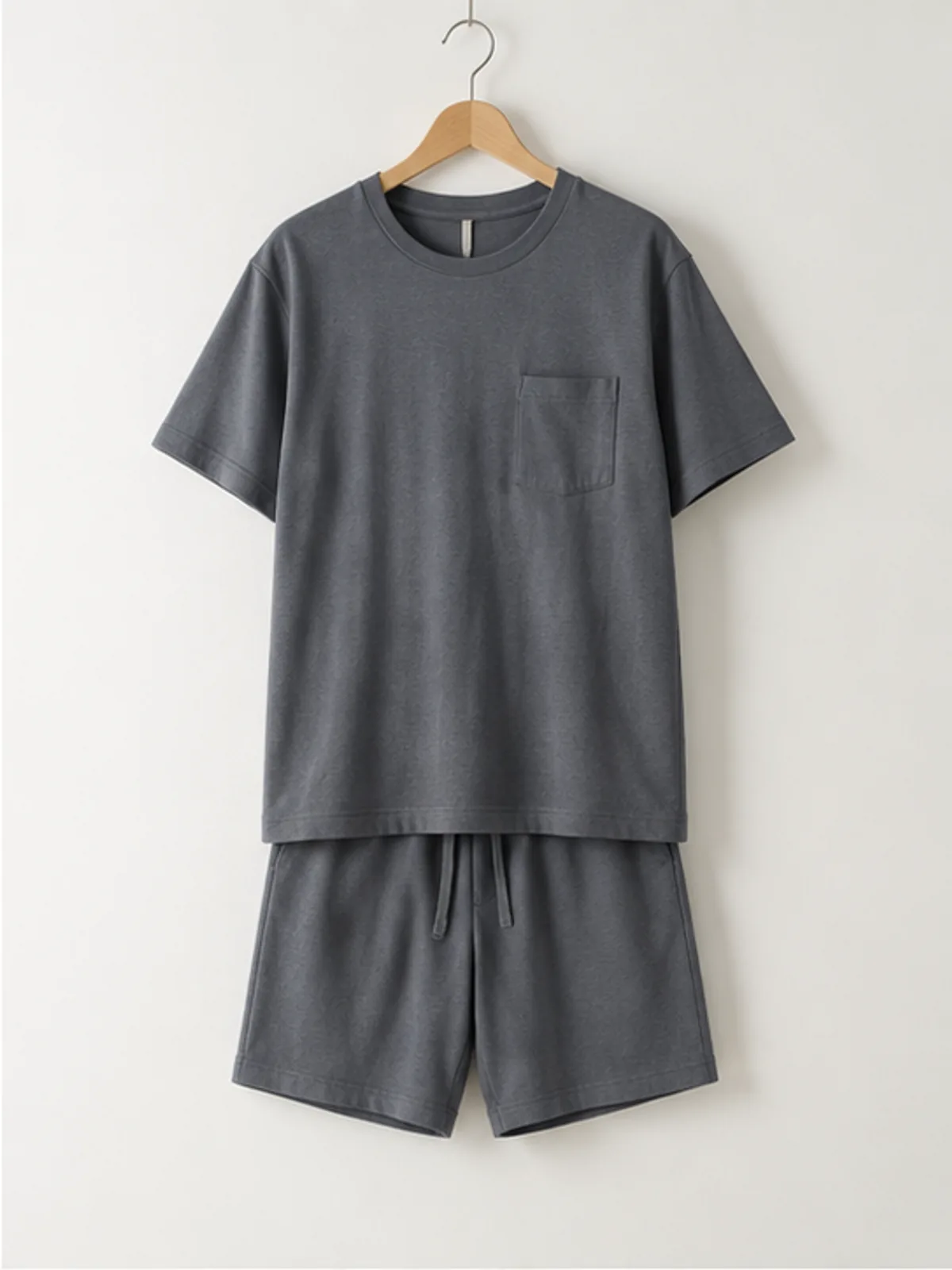 rowan cotton set 2.webp rowan cotton set hanging on a wooden hanger